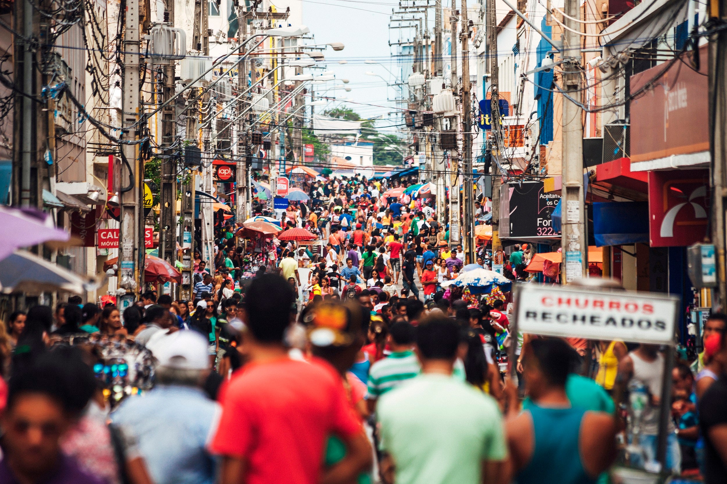 Crowds of people in a busy street